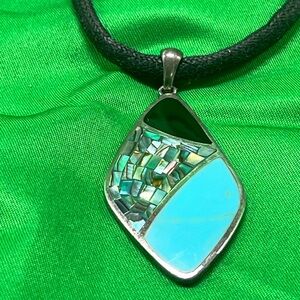 Elegant Silver and Turquoise Pendant Necklace